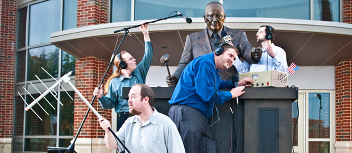 KETR staff posing in front of the Student Center